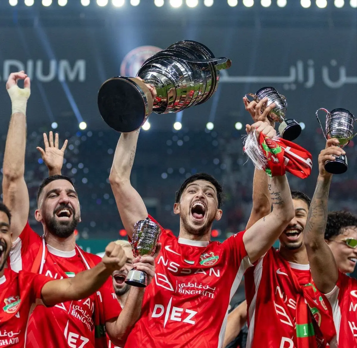دو تصویر متفاوت از بالابردن جام ریاست جمهوری توسط سردار آزمون و سعید عزت اللهی