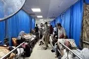 متجاوزان به کسانی که از بیمارستان الشفا خارج می‌شوند شلیک می کنند