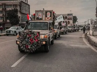 تشییع نمادین شهدای الحشد الشعبی با حضور گسترده مردم در بغداد