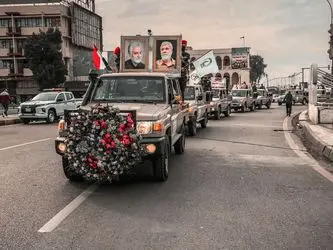 تشییع نمادین شهدای الحشد الشعبی با حضور گسترده مردم در بغداد