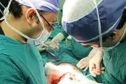 خارج کردن تومور از شکم خانم 48 ساله 
