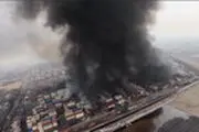 تصویر پهپادی از کانتینرهای در حال سوختنِ بندر شهید رجایی