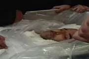 شهید شمسی پور در آغوش خانواده+تصاویر