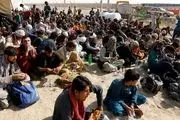 مهاجران افغانستانی از ایران وارد افغانستان می‌شوند