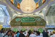 گل‌آرایی ضریح امیرالمومنین در ایام ولادت امام رضا(ع)/ گزارش تصویری