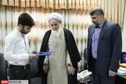 اهدای هدیه رهبر انقلاب به قهرمان پاورلیفتینگ