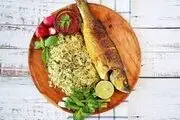 فلسفه خوردن سبزی پلو با ماهی در شب عید