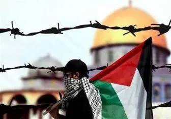 قدردانی مردم فلسطین از کریمی/ عکس