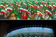 رونمایی از دیوارنگاره جدید میدان ولیعصر با شعار ایران یکپارچه