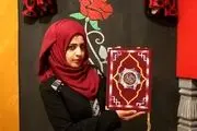 قرآن دست‌نویس‌ دختر فلسطینی/ عکس