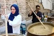 عکسی از بازیگر ایرانی و همسرش پای دیگ نذری