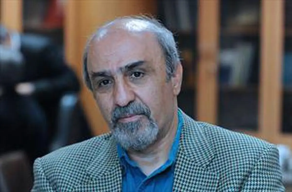 گودرزی با چهره ای خندان هتل المپیک را ترک کرد/ عکس 