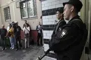 Russian police search protest leaders apartments