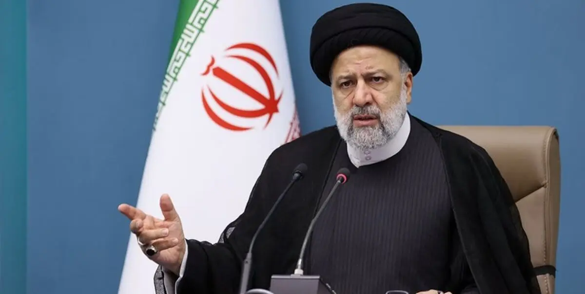 تصویری از فاتحه خوانی رئیسی بر سر مزار هاشمی