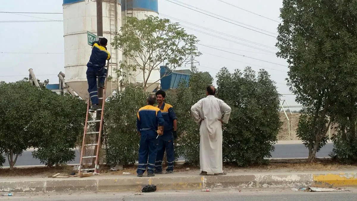 بسیج معاونت حمل و نقل شهرداری تهران تابلوهای مسیر کربلا تا نجف را نوسازی کرد