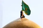 پرچم گنبد حرم امام رضا(ع) تعویض شد /گزارش تصویری