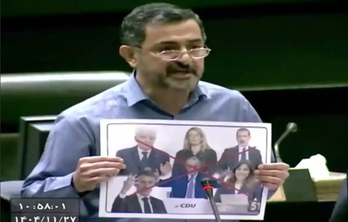 پاره کردن عکس مقامات خاص توسط نماینده تهران در مجلس 