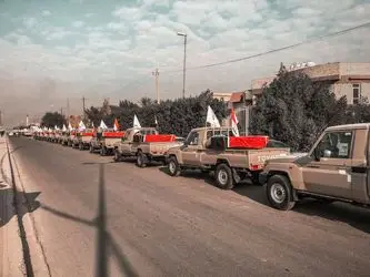 تشییع نمادین شهدای الحشد الشعبی با حضور گسترده مردم در بغداد