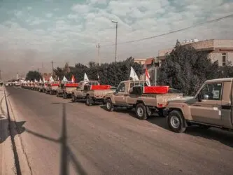 تشییع نمادین شهدای الحشد الشعبی با حضور گسترده مردم در بغداد
