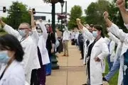 پیوستن کادر درمانی آمریکا به معترضان ضد نژادپرستی + تصاویر
