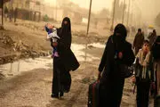 فرار مردم موصل از دست گروه تکفیری داعش/گزارش تصویری