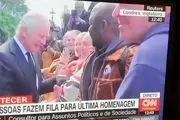 خودداری شاه انگلیس از دست دادن با یک سیاه‌پوست+فیلم