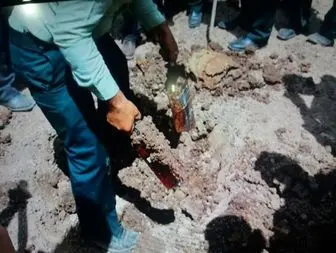 قاچاقچیانی که مشروبات الکلی را در زمین کشاورزی دفن کردند