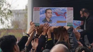 مراسم استقبال از شهدای خان طومان در فرودگاه مشهد