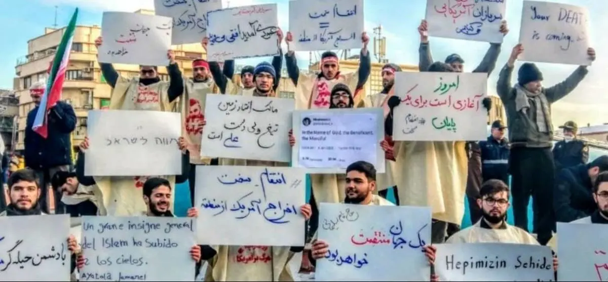 حضور دانشجویان کفنپوش در مراسم تشییع پیکر شهید حاج قاسم سلیمانی/عکس