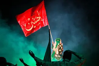 تعویض پرچم حرم سیدالشهدا(ع) با شروع ماه ربیع الاول/عکس