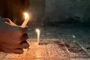  روشن کردن شمع برای دو شهید در مشهد