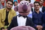 عروسک جناب خان در کیف بازیکن ملی پوش