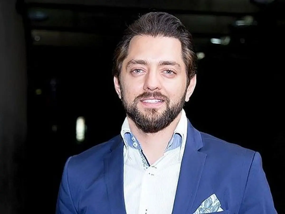 گربه خانگی در کنار بهرام رادان /عکس