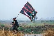 پذیرایی فرمانده عراقی از زائرین امام حسین(ع)/عکس