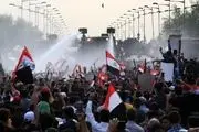 عکس/ پرچم آمریکا زیرپای معترضان عراقی

