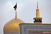 تعویض پرچم گنبد رضوی در سالروز شهادت حضرت امام باقر(ع) /عکس

