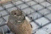 قبری در میان آسمان خراش چینی + عکس