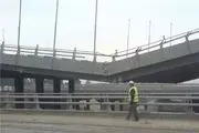 برچیدن پل موقت تقاطع رودخانه کن با بزرگراه فتح