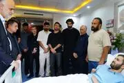 دیدار قلعه‌نویی و ملی‌پوشان از جانباز بزرگ ایران