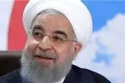 تصویری قدیمی از حسن روحانی در آغوش پدر/ عکس