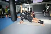تمرین صبحگاهی بازیکنان تیم ملی در سالن بدنسازی