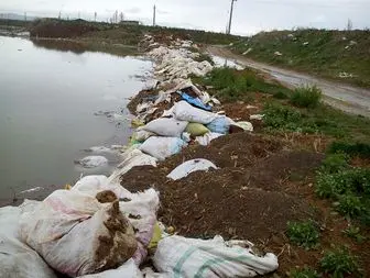 انباشت زباله های ساختمانی در حاشیه رودخانه و سد بهار + تصاویر