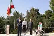 نعمتی پرچم کشورمان را تحویل نیکخواه بهرامی داد+ عکس