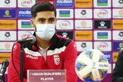 عکس علیرضا جهانبخش بر روی ساختمانی در دوحه

