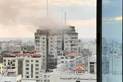  لحظه فرو ریختن برج فلسطین در پی حملات هوایی جنگنده‌های اسرائیل