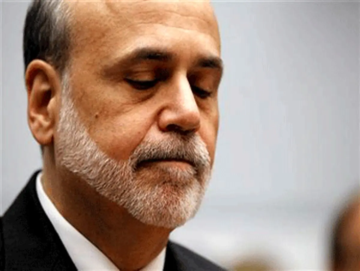 Fed says economy may need help, keeps policy on hold
