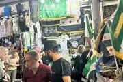 
عرضه پرچم داعش در بازارهای دمشق
