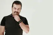 مهراب قاسم خانی به همراه پسرش در باشگاه بدنسازی /عکس