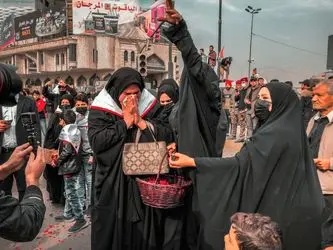 تشییع نمادین شهدای الحشد الشعبی با حضور گسترده مردم در بغداد