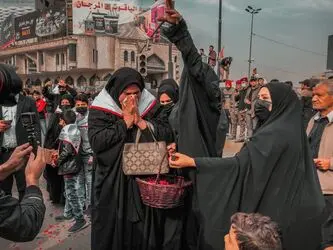 تشییع نمادین شهدای الحشد الشعبی با حضور گسترده مردم در بغداد